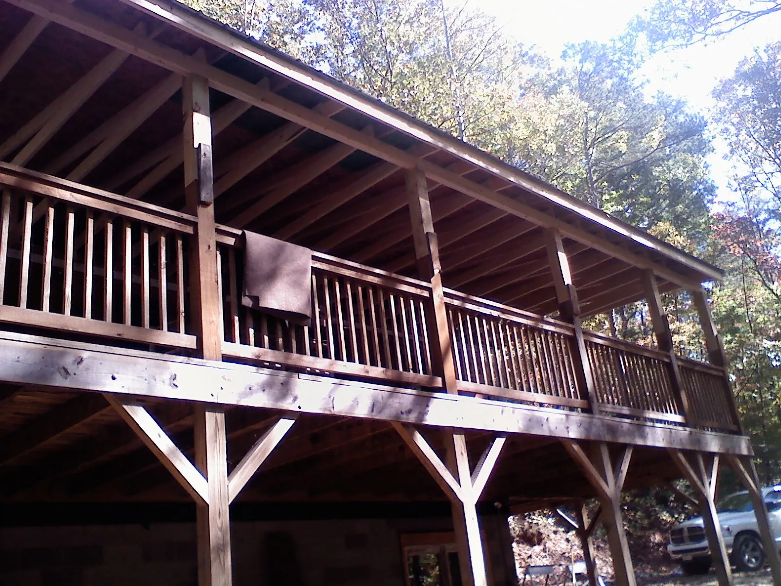 Timber framing under a new elevated porch and deck — Roof Leak Repair in Central Point by Roofing Brothers